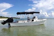 Dual 3-Bow Round Tube Bimini Tops on a 1970 Proline Pro 24 Boat.