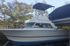 3-Bow Round Tube  Bimini Top A4657UB - Sunbrella - Jet Black  - 1979 Correct Craft San Juan Flybridge