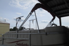 Square Tube Bimini Top Stored on Rear Brace Kit on a Sweetwater Tuscany Pontoon Boat