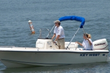 An example of the Carver bimini top with an attached rear brace kit stored inside the storage boot.