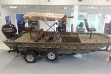 3-Bow Round Tube Bimini Top - Camo Series, Mossy Oak Shadow Grass pattern w/Black Matte Frame on a Lowe RX 1860 SC Boat.