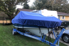 Styled to Fit Cover - V-Hull Low Profile Cuddy Cabin Boat w/ Windshield and Bow Rail - 1987 Larson Delta 190 Cuddy